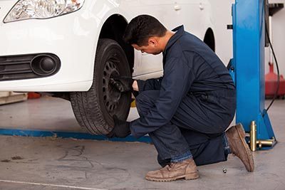 Mechanic changing tire